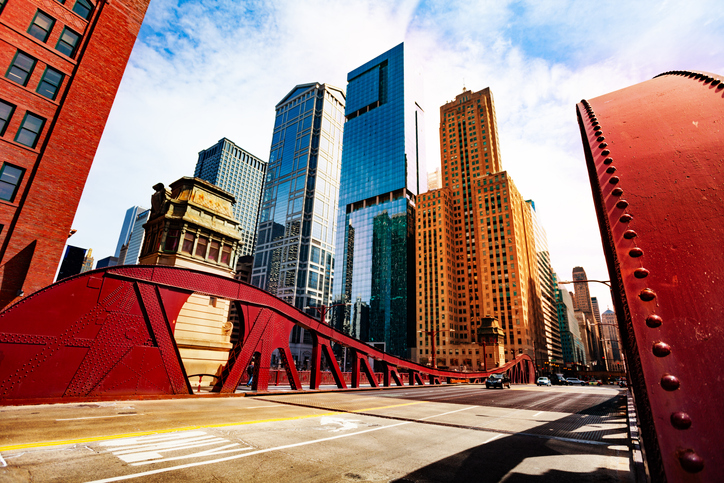 Bridge over Chicago river in city downtown and office buildings on background, Illinois, USA